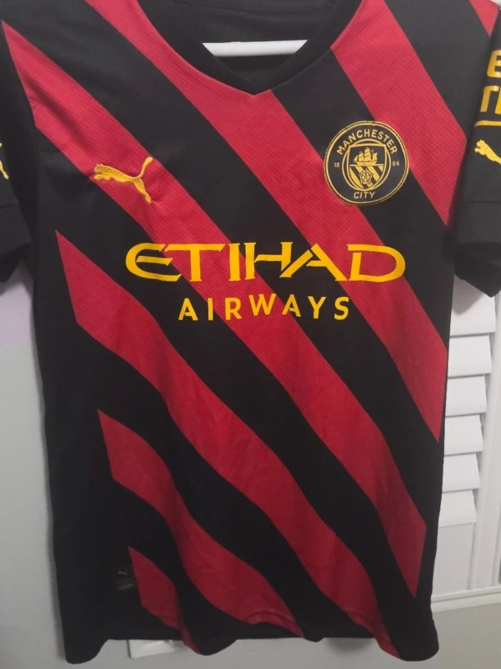 Puma Kids' Black & Red Manchester City Jersey with Yellow Accents